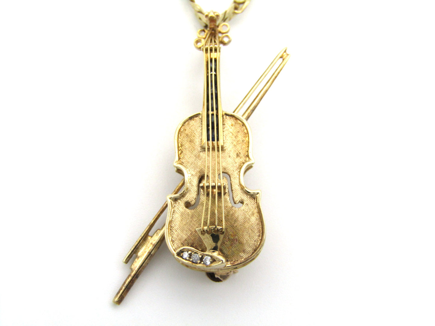 9K gold diamond and sapphire violin brooch/ pendant, Birmingham, 1991.