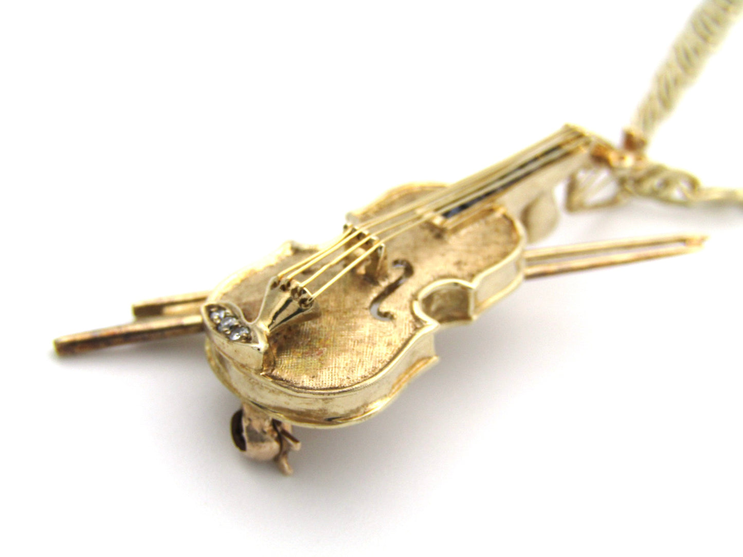 9K gold diamond and sapphire violin brooch/ pendant, Birmingham, 1991.
