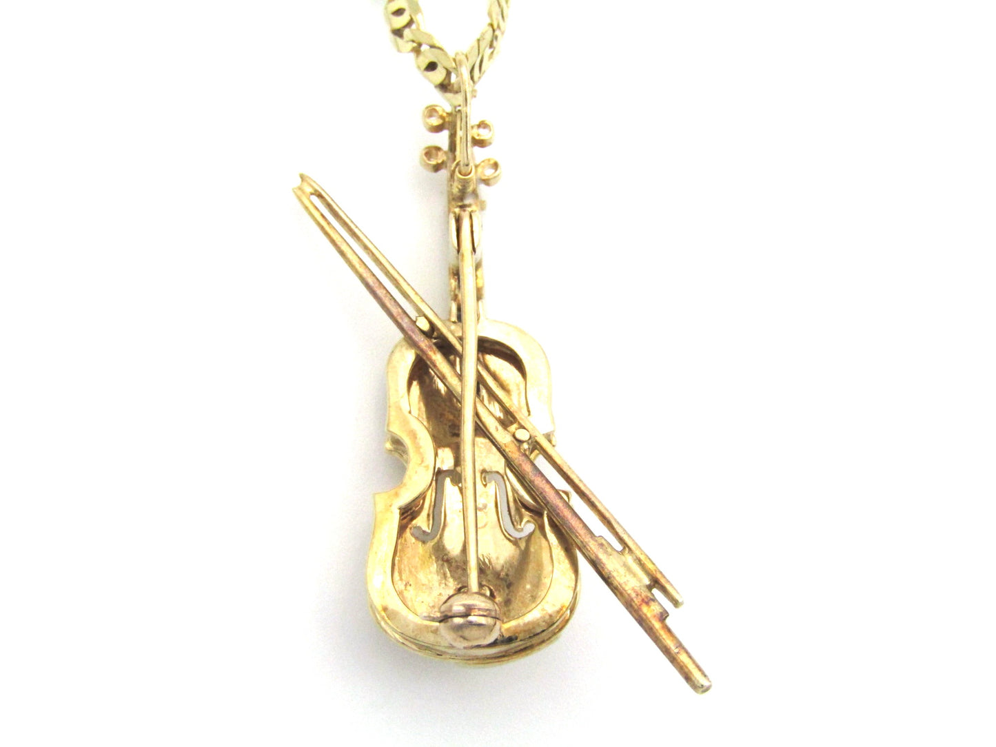 9K gold diamond and sapphire violin brooch/ pendant, Birmingham, 1991.