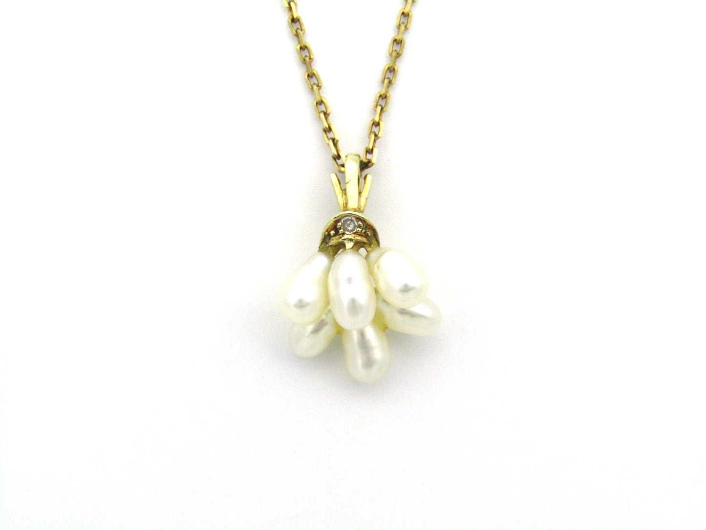 9K gold pearl 'tassel' and diamond pendant.