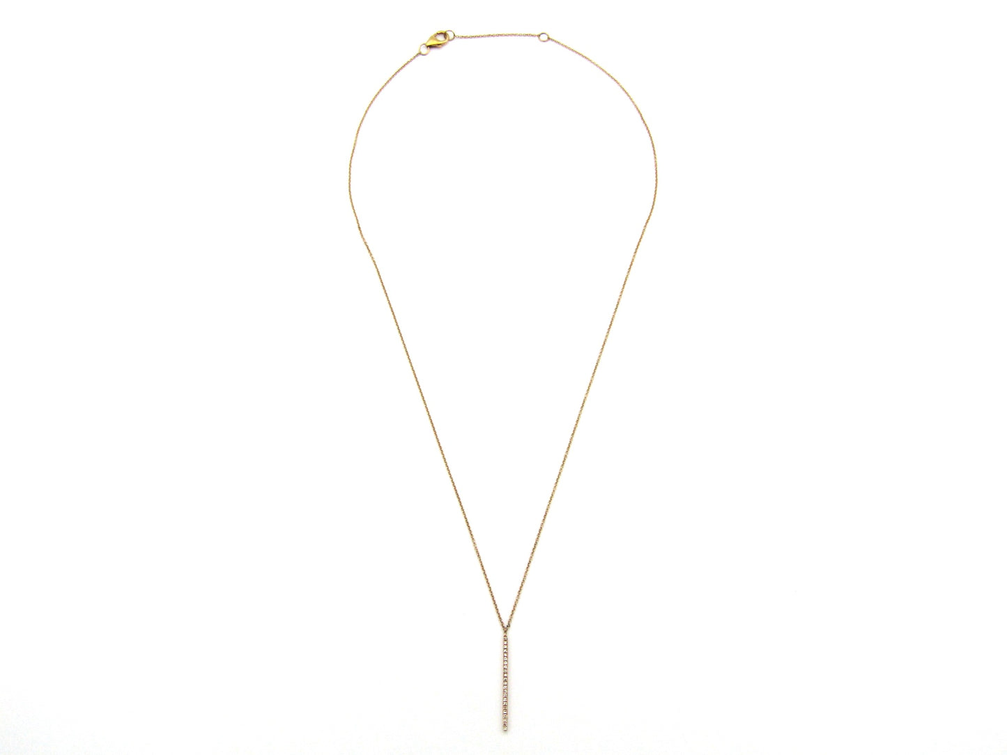9K gold diamond bar necklace.