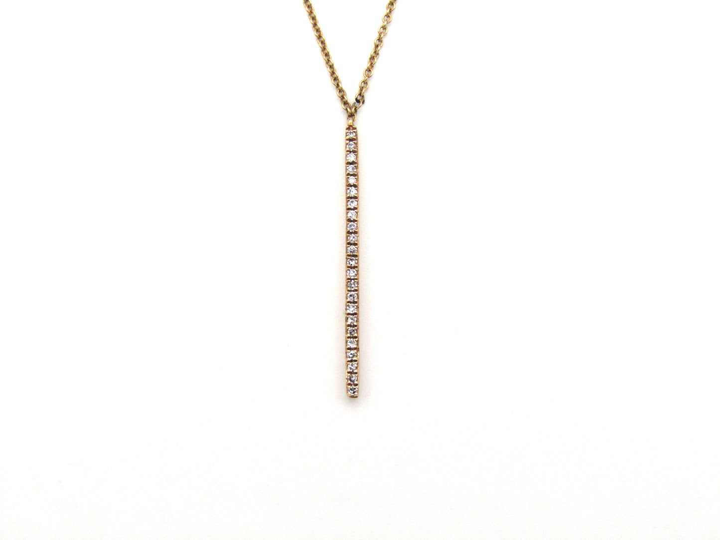 9K gold diamond bar necklace.