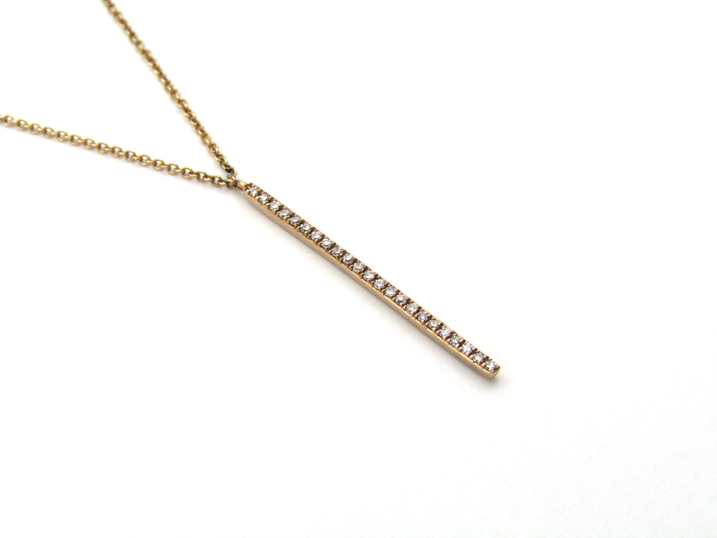 9K gold diamond bar necklace.