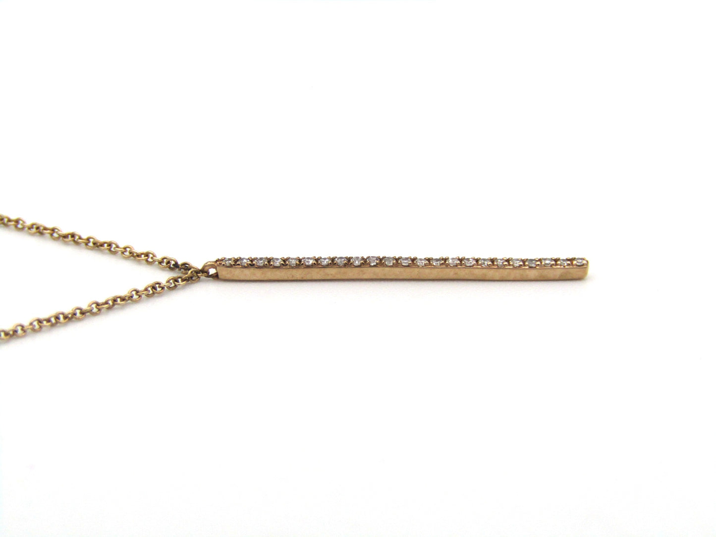 9K gold diamond bar necklace.