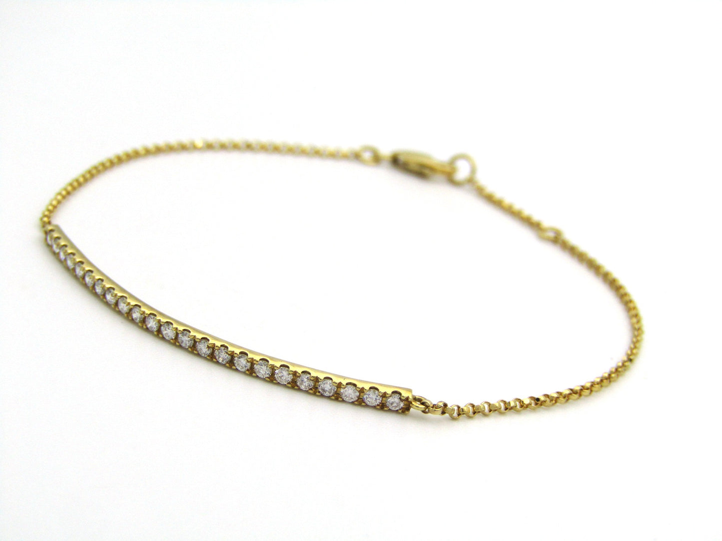 18K gold diamond bar bracelet.