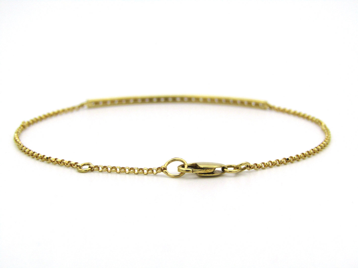 18K gold diamond bar bracelet.