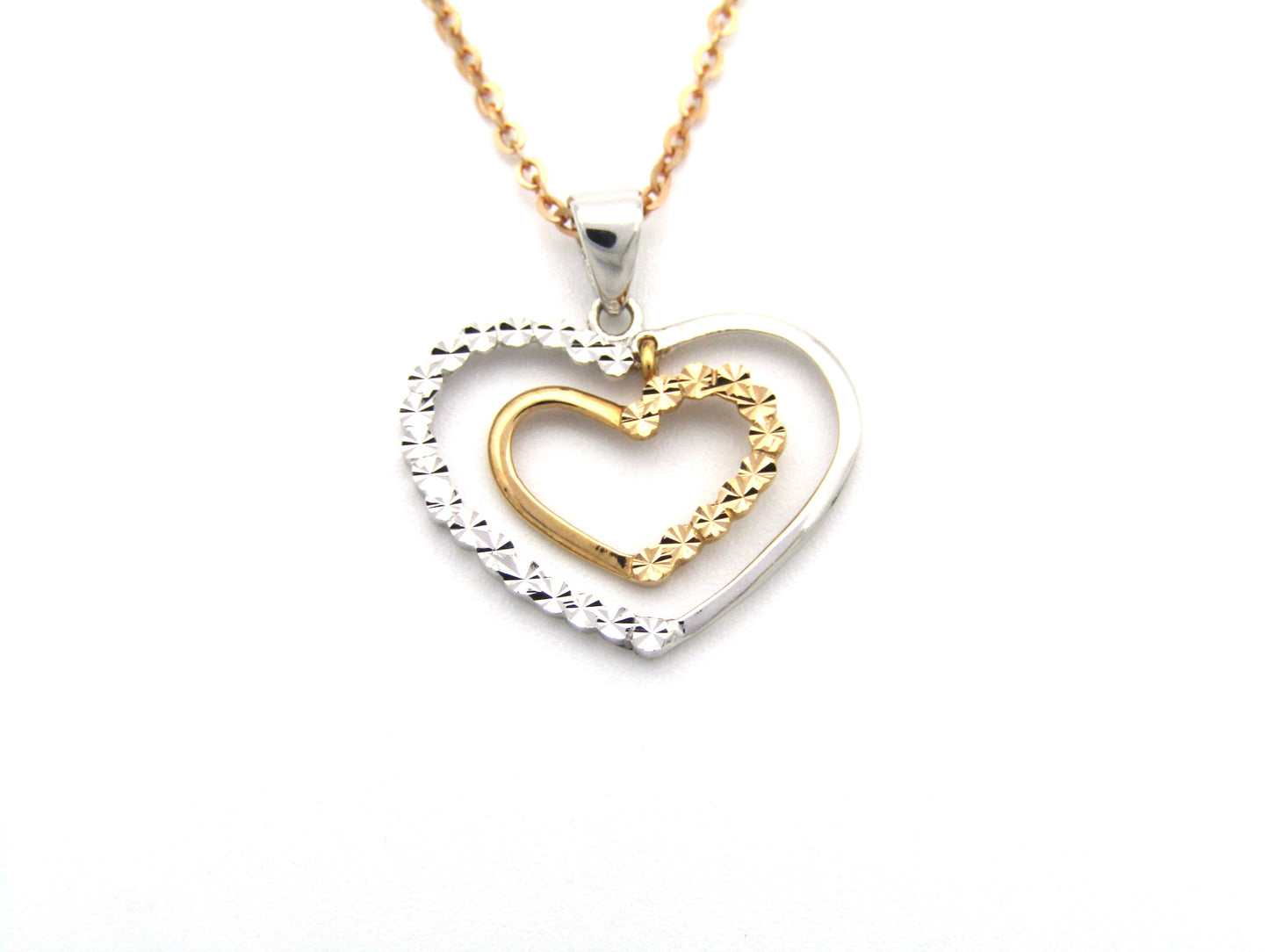 18K gold double-heart pendant.