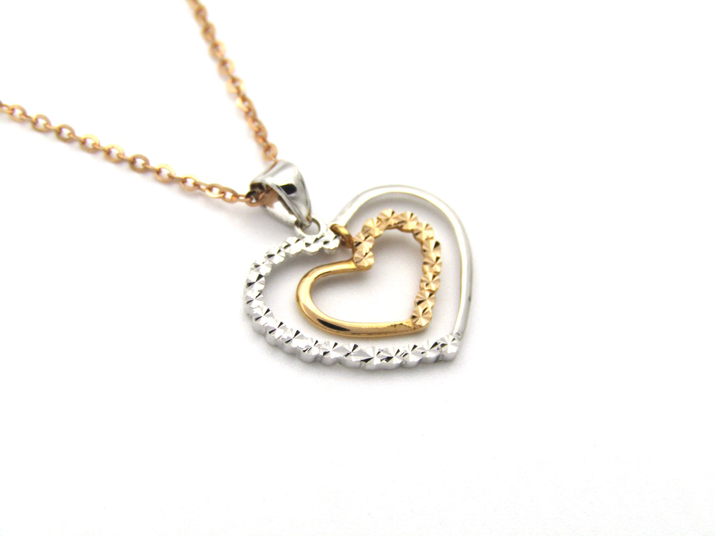 18K gold double-heart pendant.