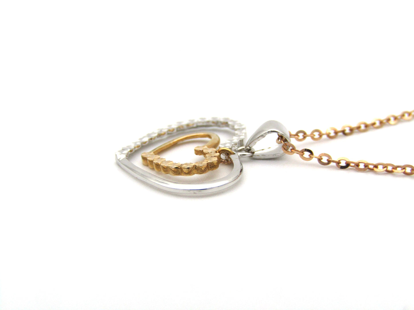18K gold double-heart pendant.