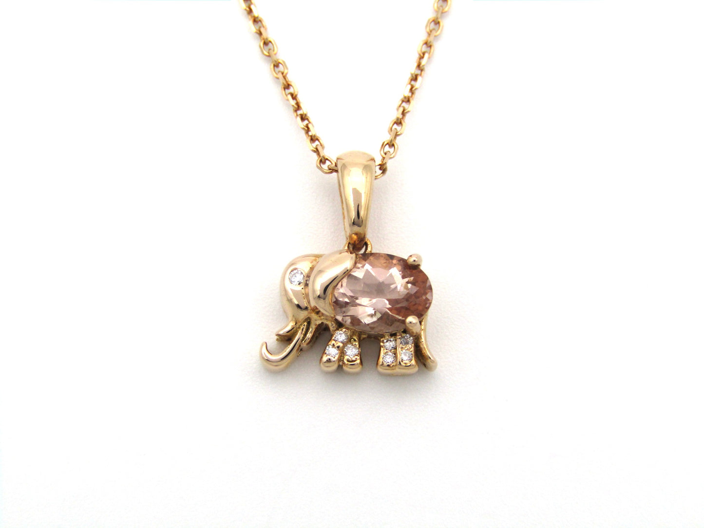 18K gold morganite and diamond elephant pendant.