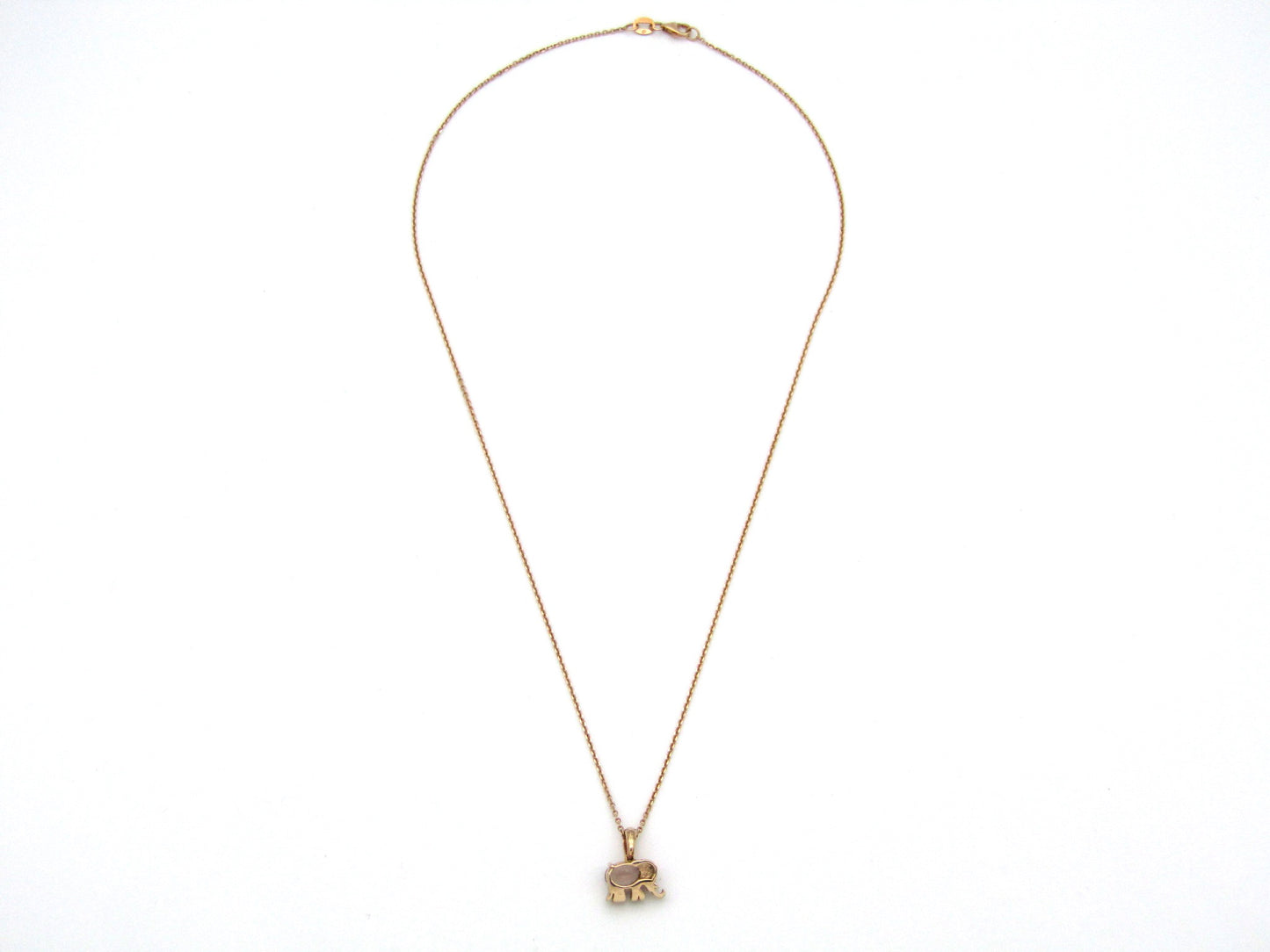 18K gold morganite and diamond elephant pendant.