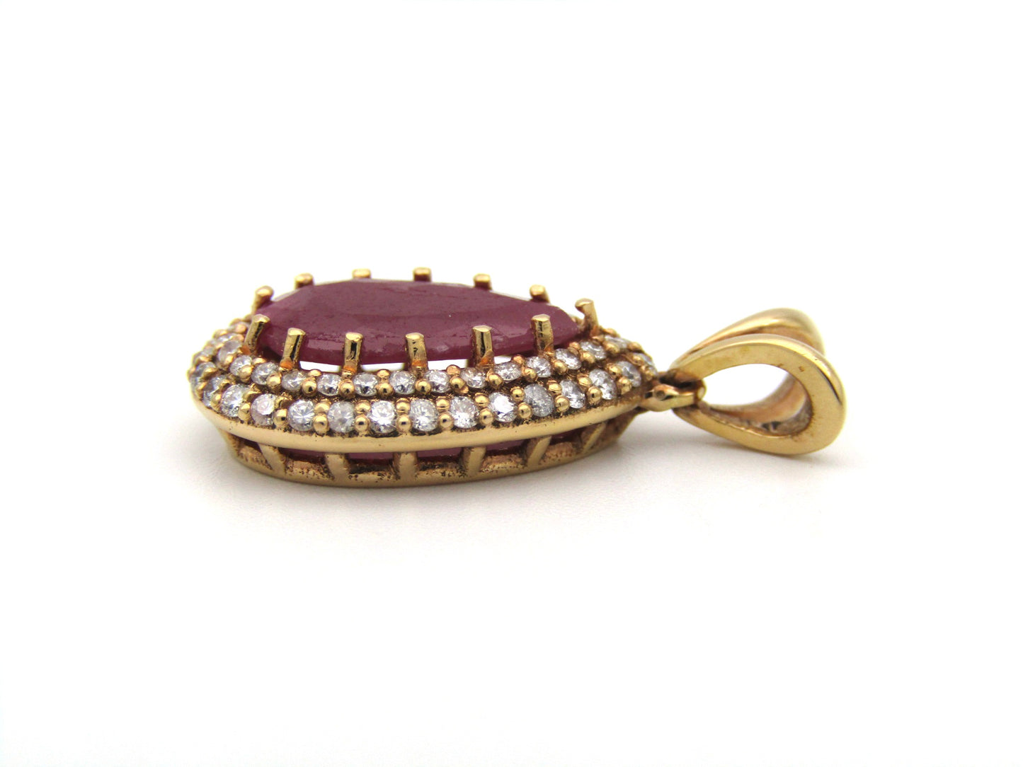 18K gold ruby and diamond pendant.