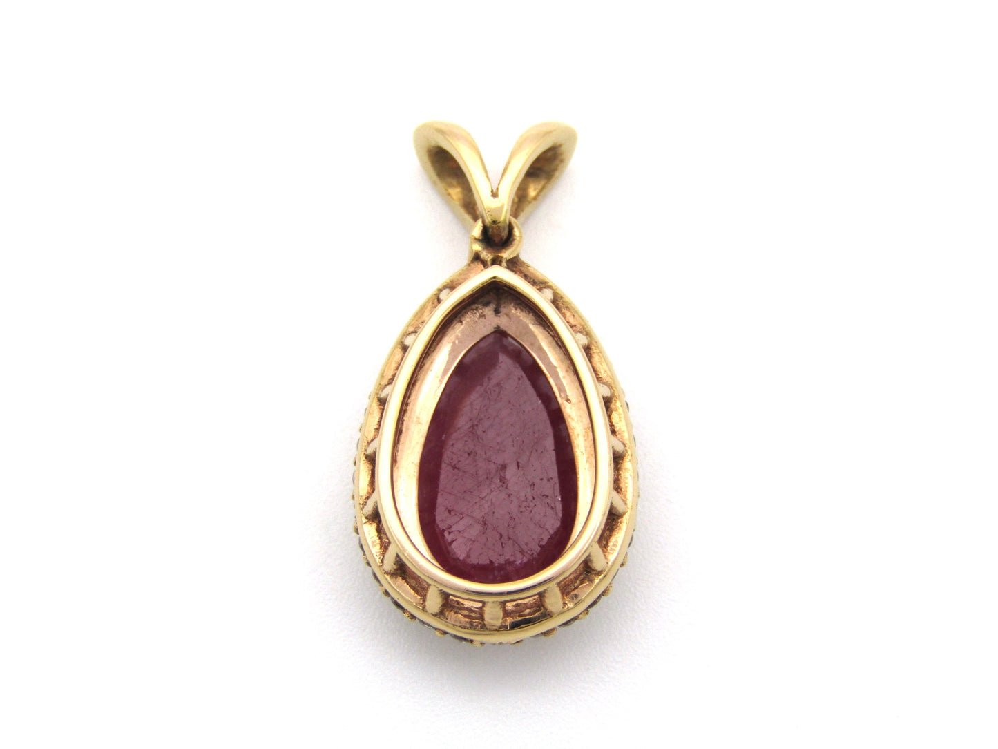 18K gold ruby and diamond pendant.
