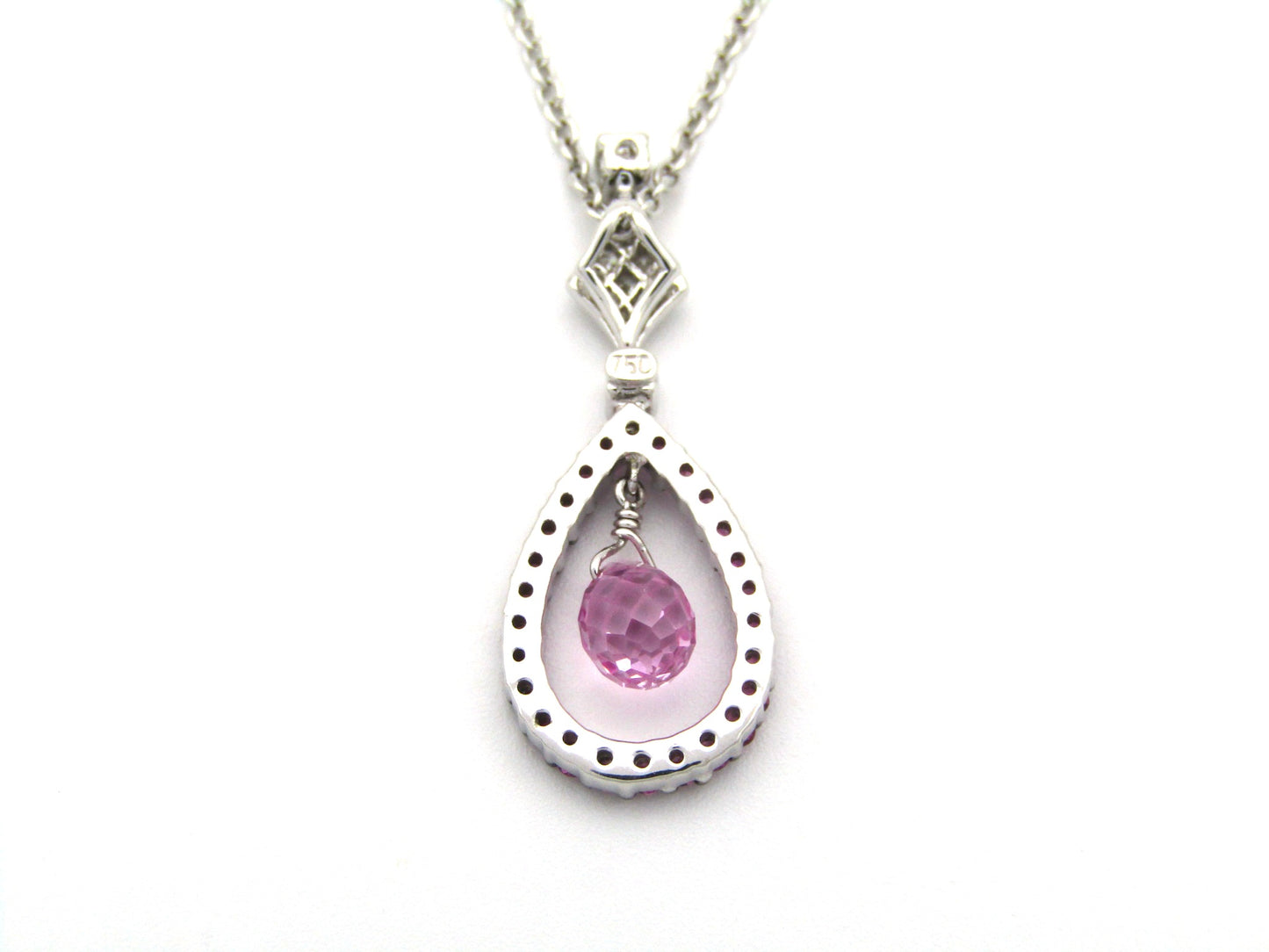 18K gold pink sapphire and diamond pendant.