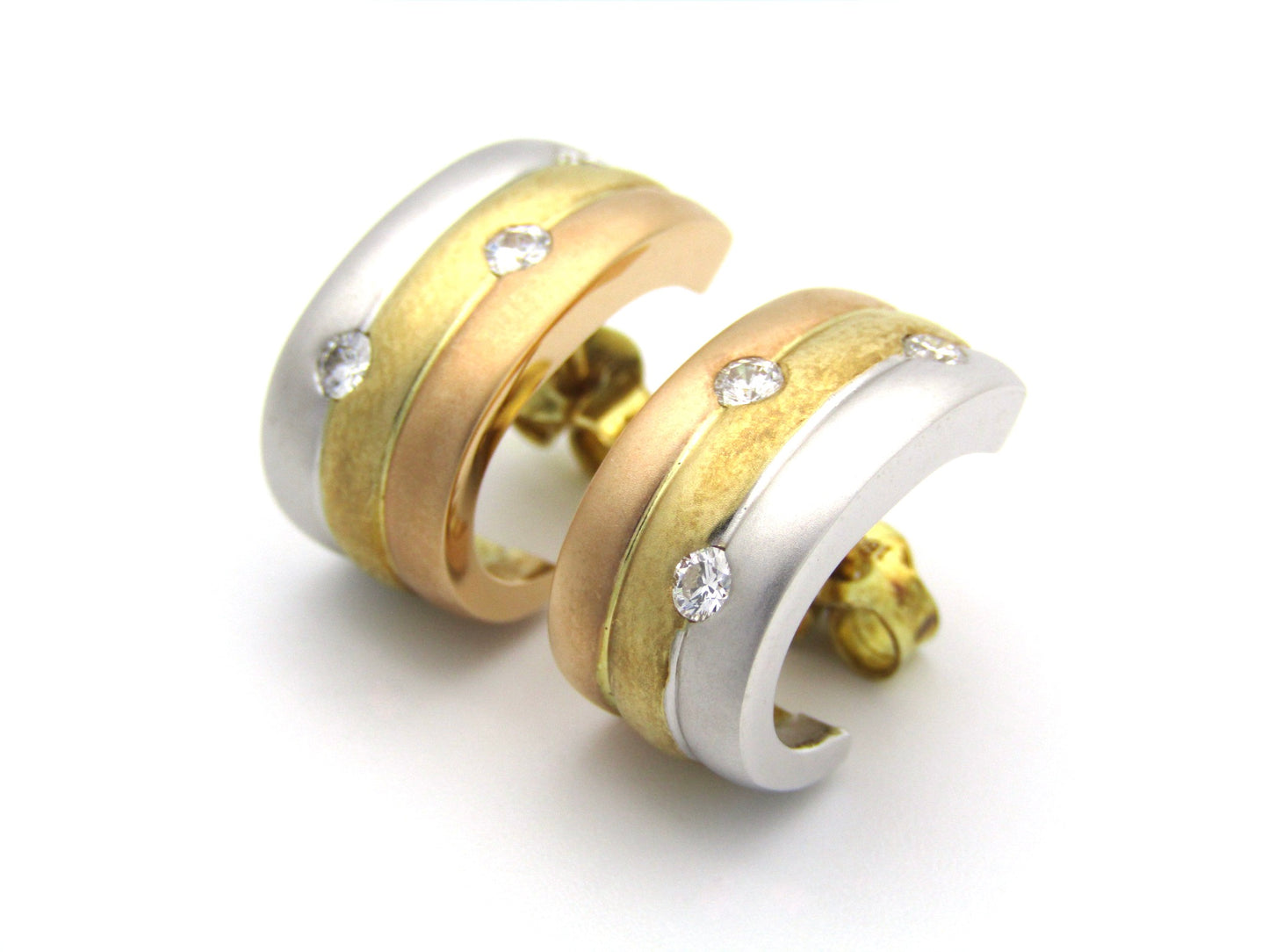 18K tri-colour gold diamond huggie earrings, circa 1970's.