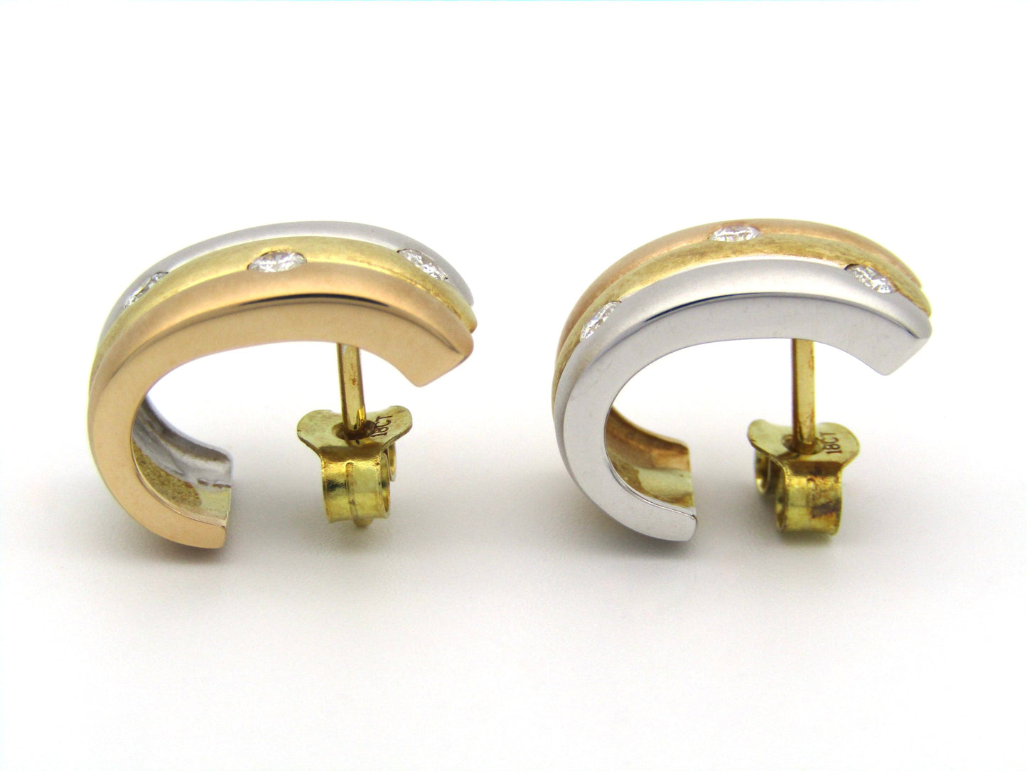 18K tri-colour gold diamond huggie earrings, circa 1970's.