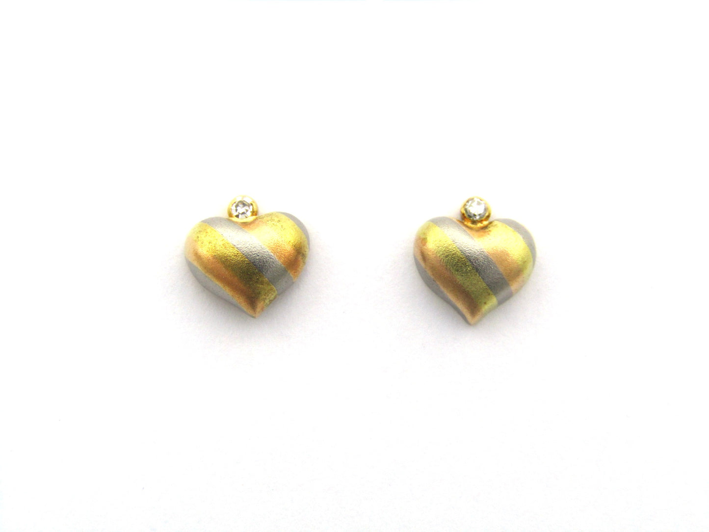 18K gold tri-colour gold diamond heart earrings by Jka Köhle, circa 1970's.