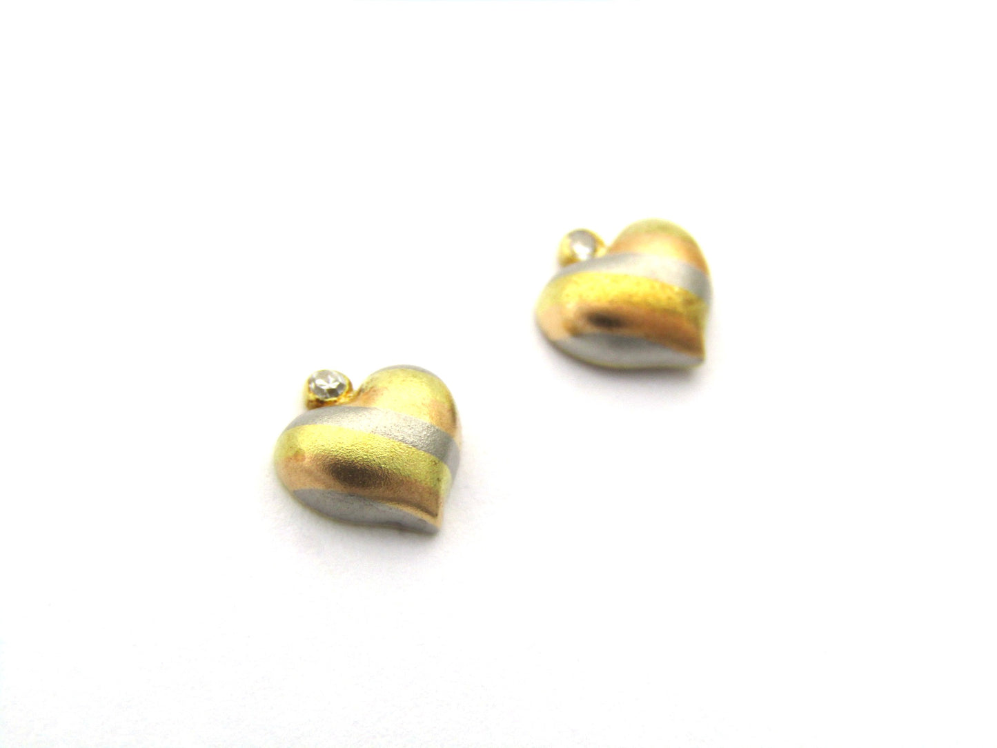 18K gold tri-colour gold diamond heart earrings by Jka Köhle, circa 1970's.