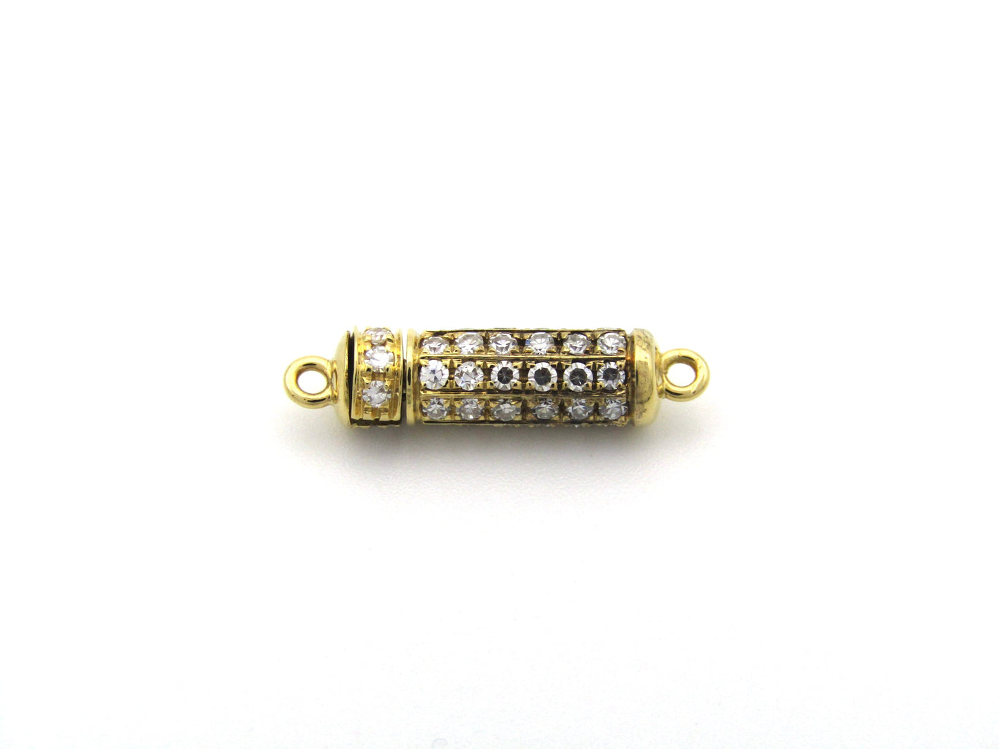 18K gold diamond clasp, circa 1970's.
