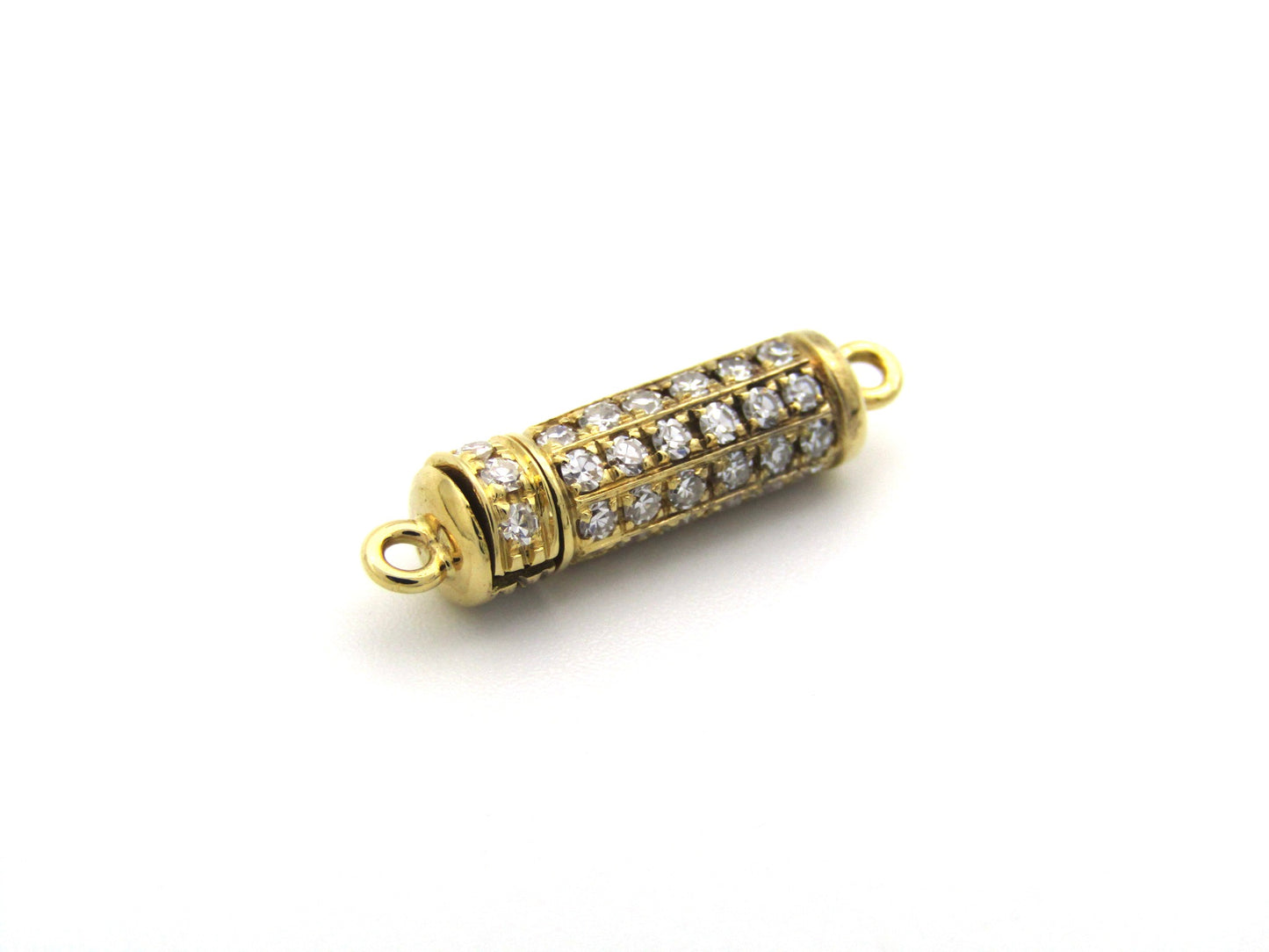 18K gold diamond clasp, circa 1970's.