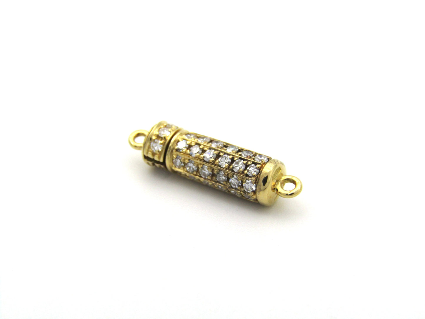 18K gold diamond clasp, circa 1970's.