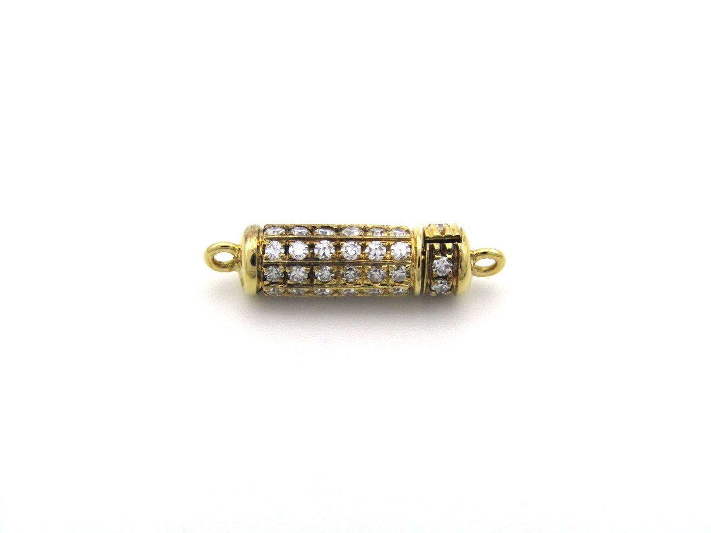 18K gold diamond clasp, circa 1970's.