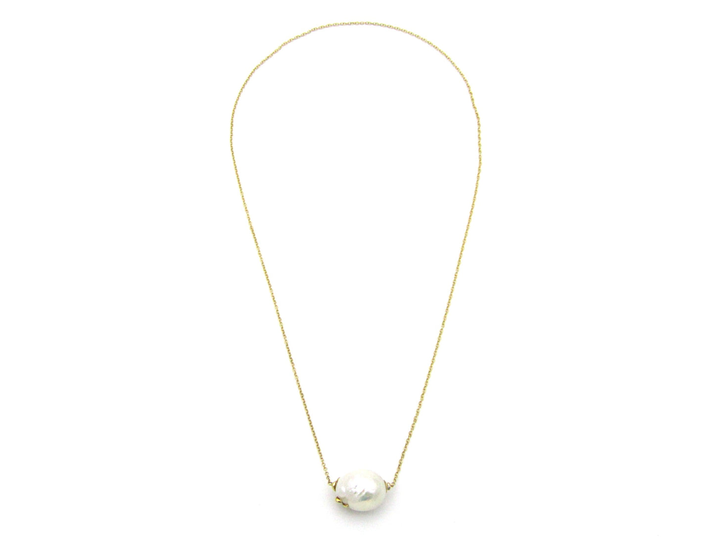 14K gold baroque pearl and diamond floating necklace.