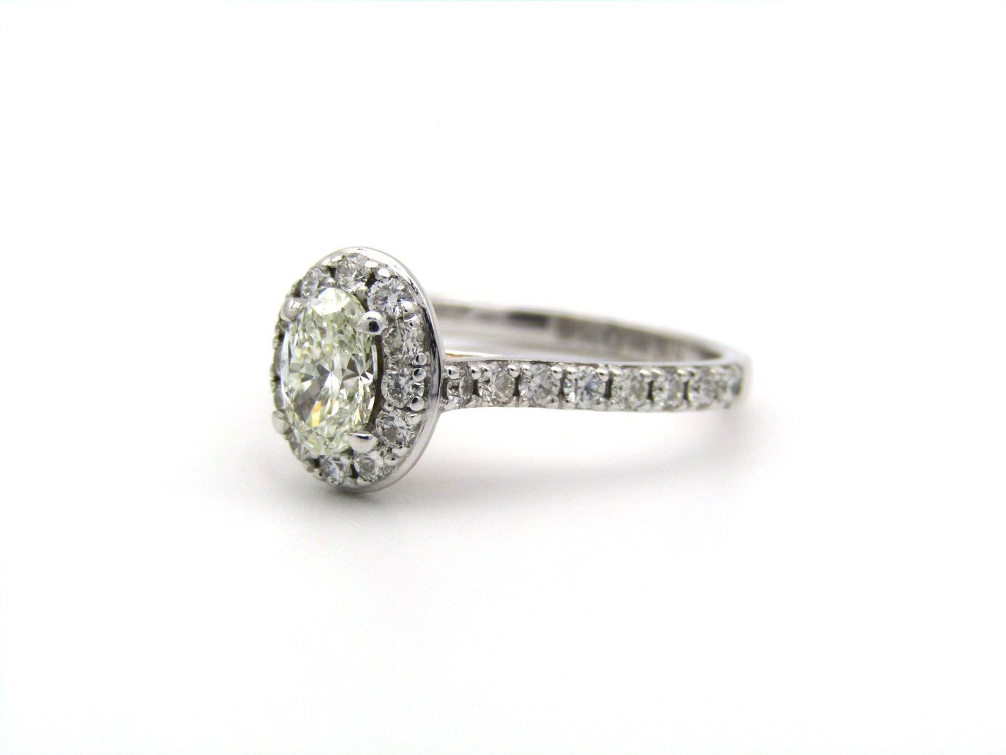 Platinum and 18K gold Angel Halo diamond ring by Browns.