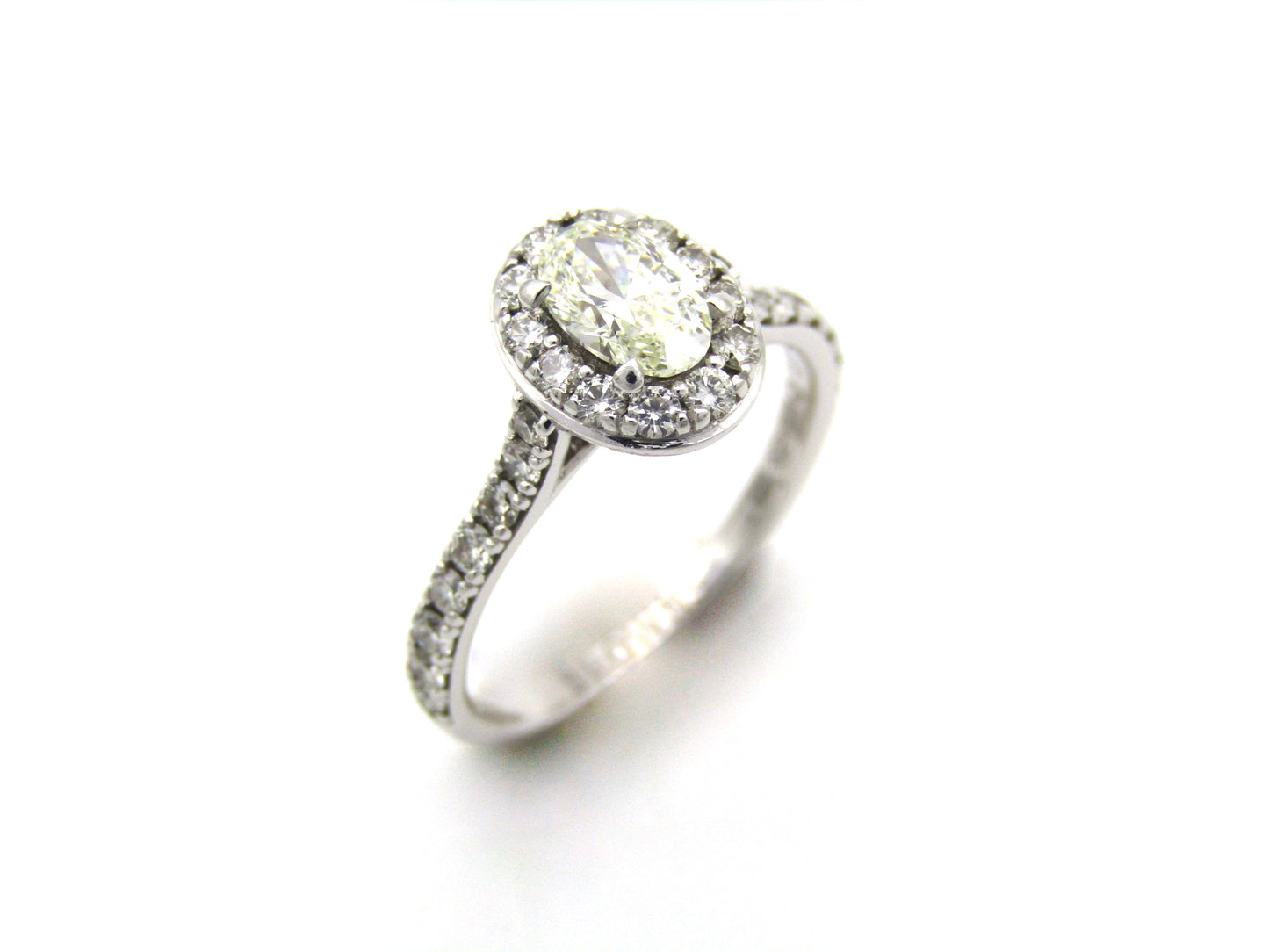 Platinum and 18K gold Angel Halo diamond ring by Browns.