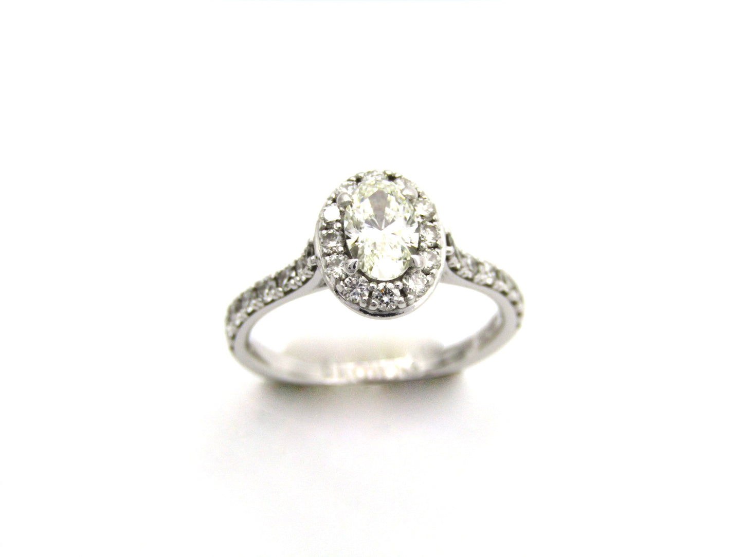 Platinum and 18K gold Angel Halo diamond ring by Browns.