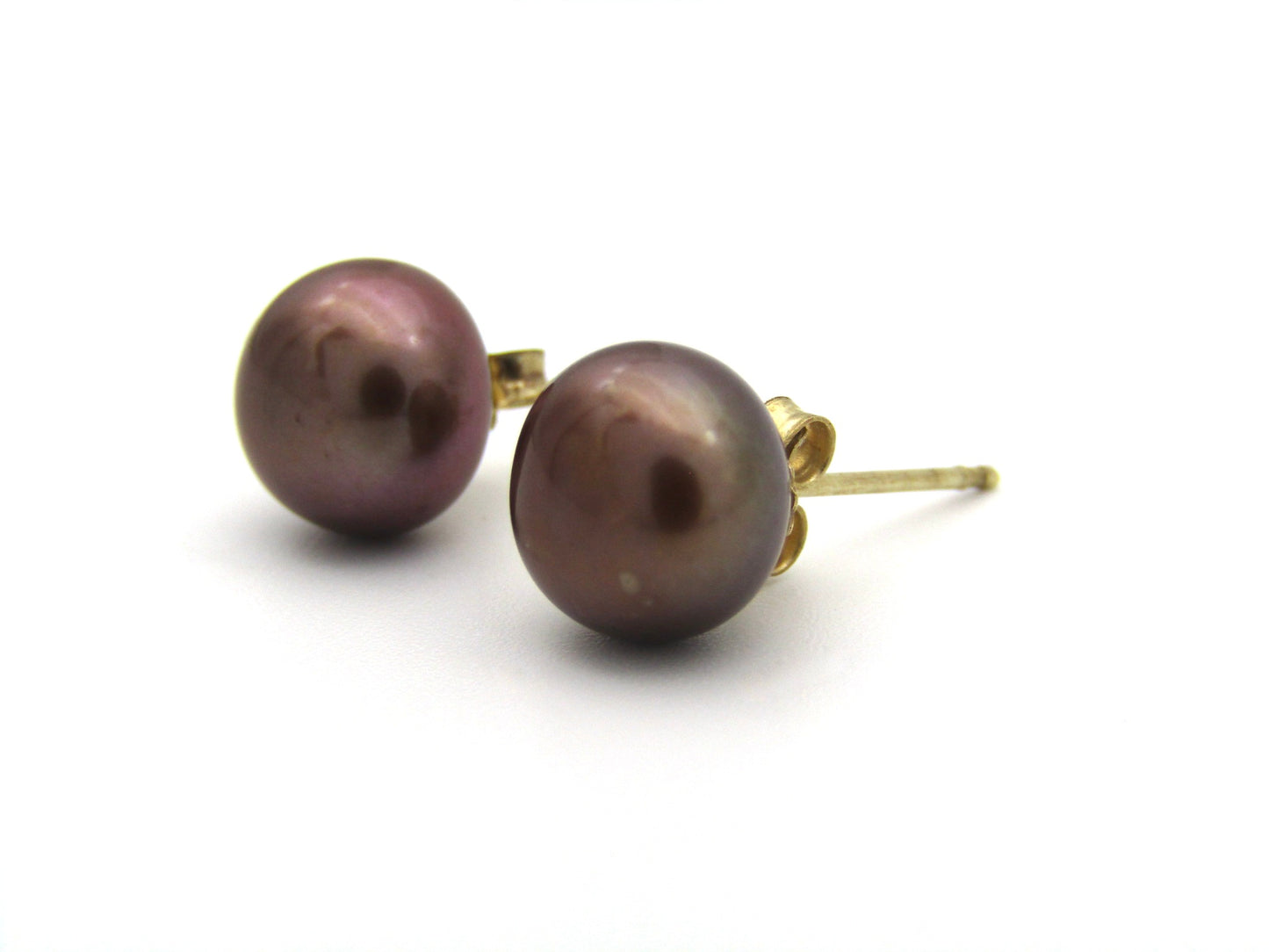 9K gold freshwater pearl stud earrings.