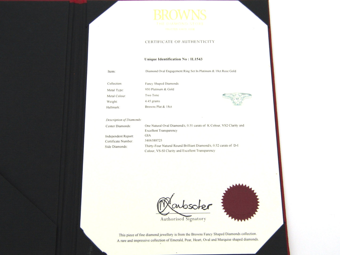 Platinum and 18K gold Angel Halo diamond ring by Browns.