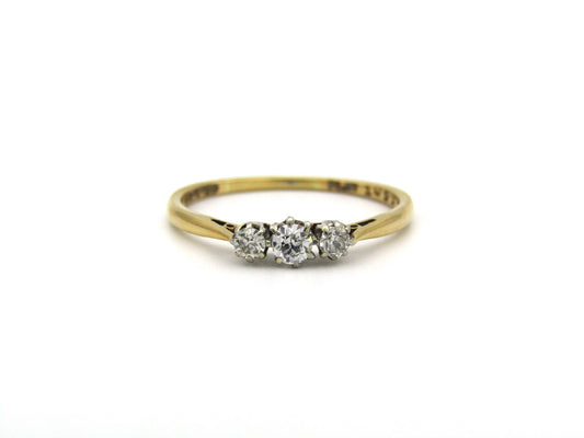 18K gold & platinum Three-stone diamond Edwardian ring, circa 1900.