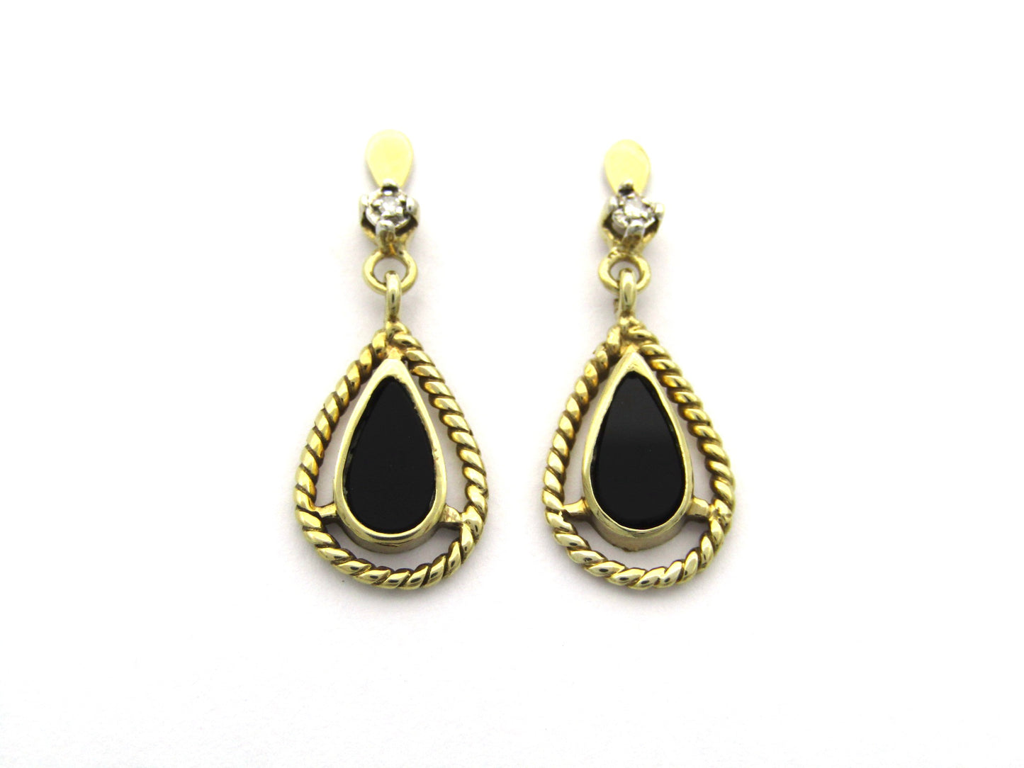 9K gold Vintage onyx and diamond dangle earrings, circa 1990's.