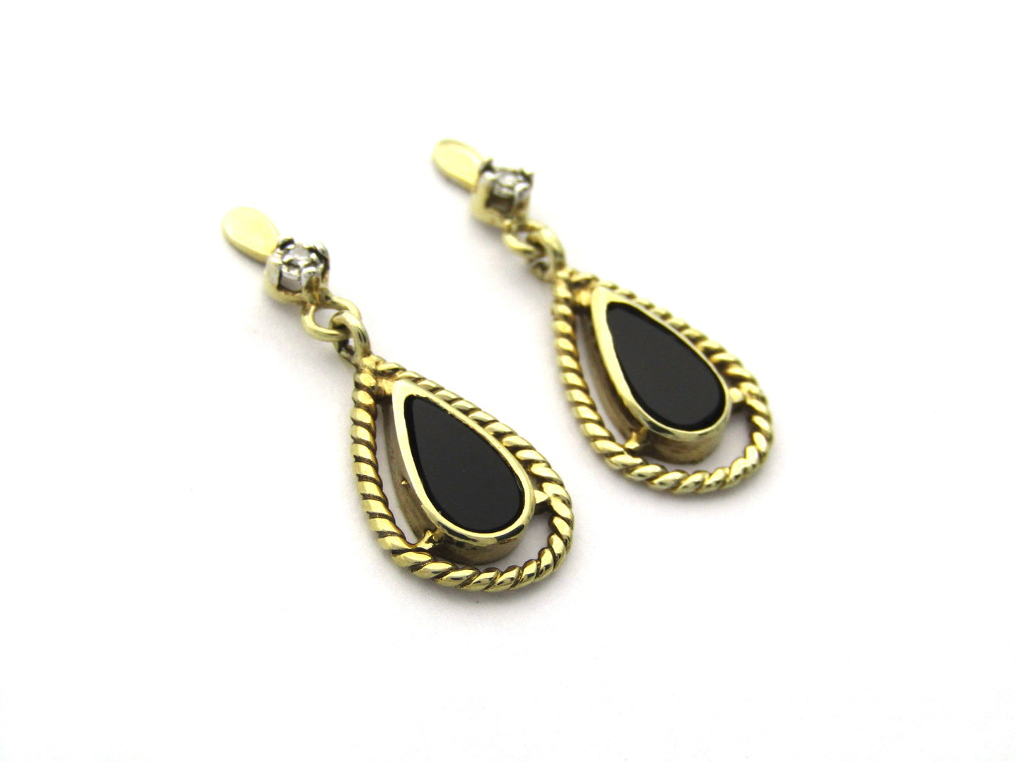 9K gold Vintage onyx and diamond dangle earrings, circa 1990's.