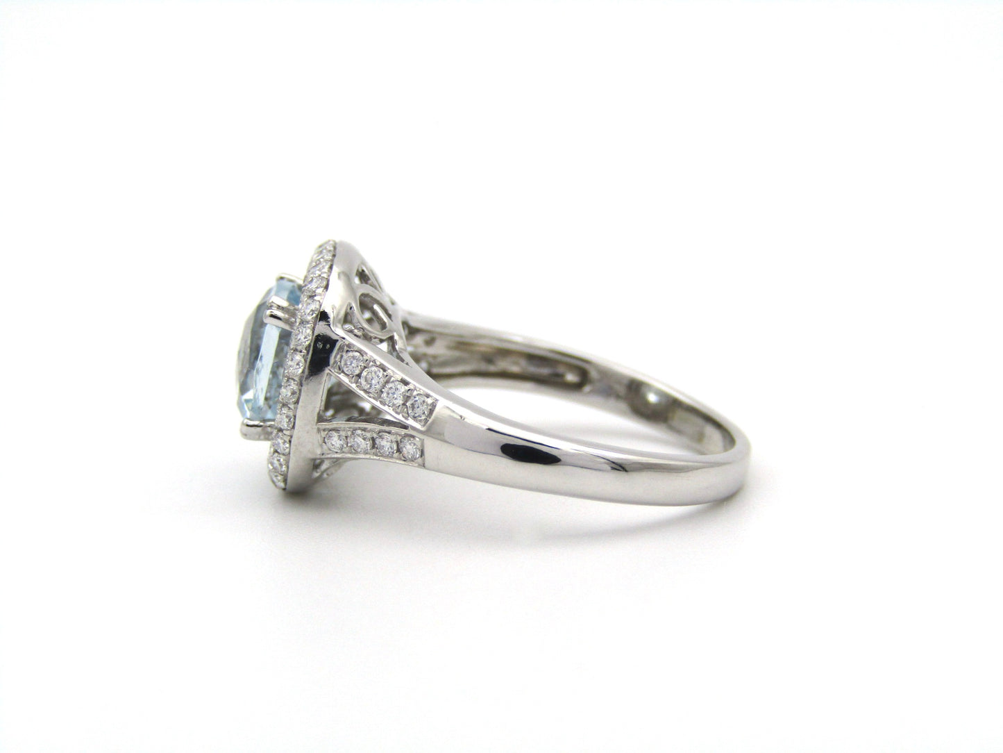 14K gold aquamarine and diamond double halo ring by Browns.