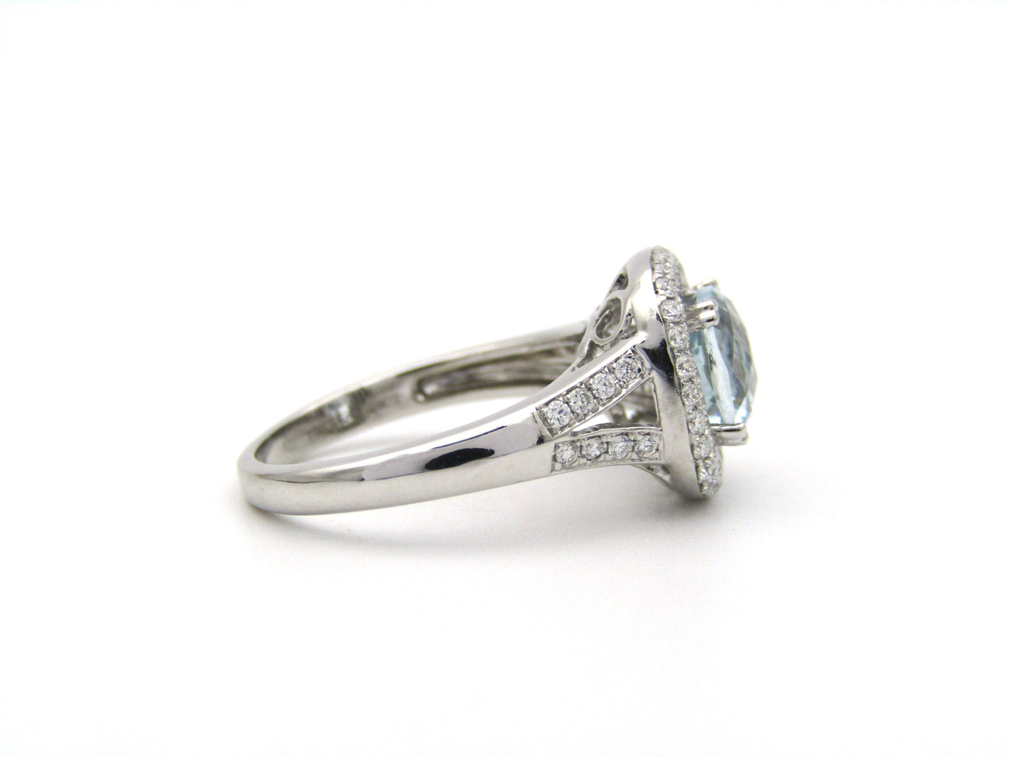 14K gold aquamarine and diamond double halo ring by Browns.