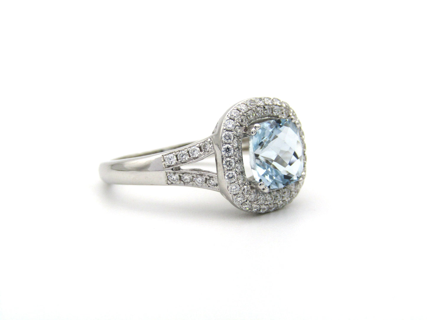 14K gold aquamarine and diamond double halo ring by Browns.