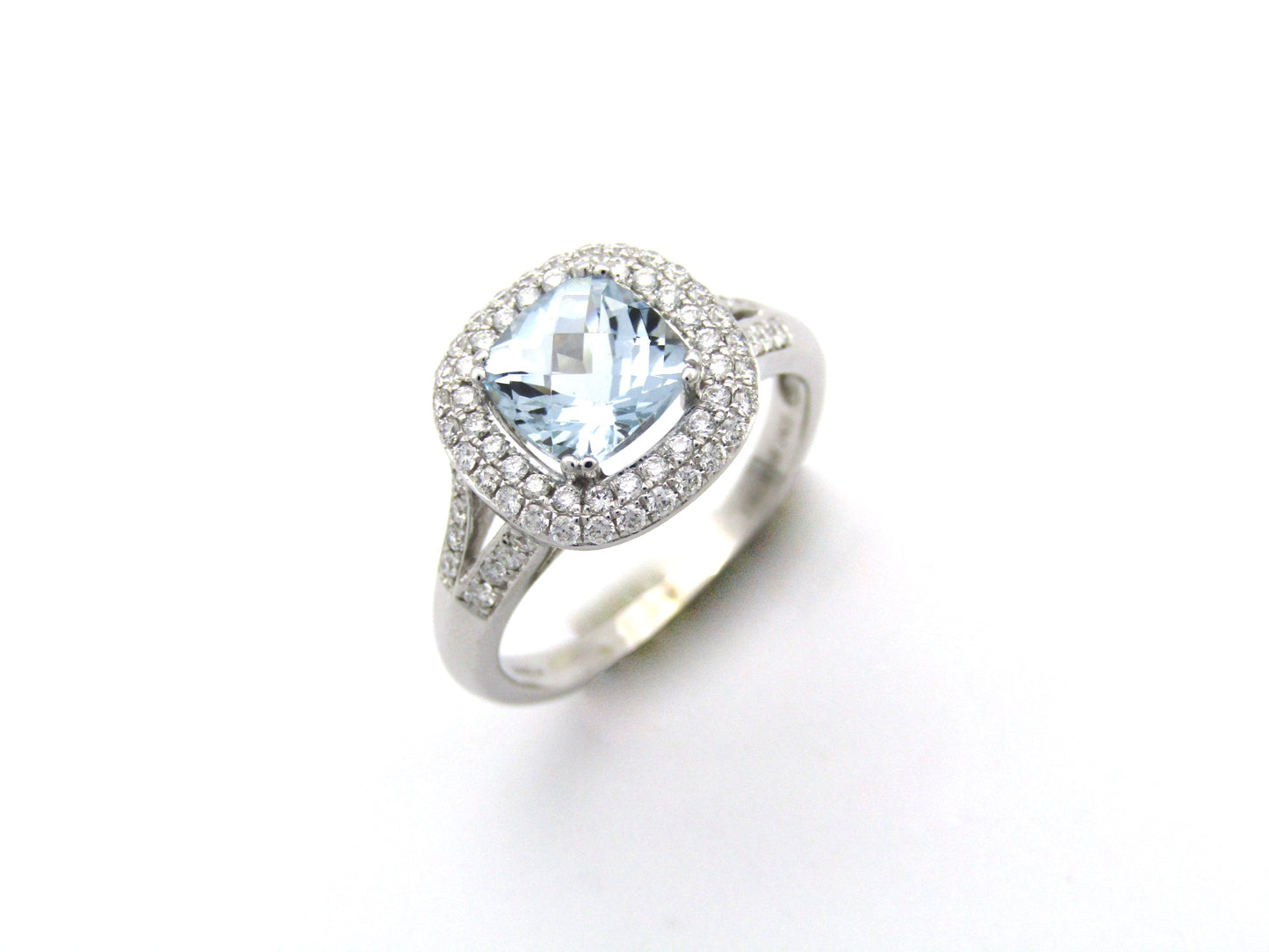 14K gold aquamarine and diamond double halo ring by Browns.