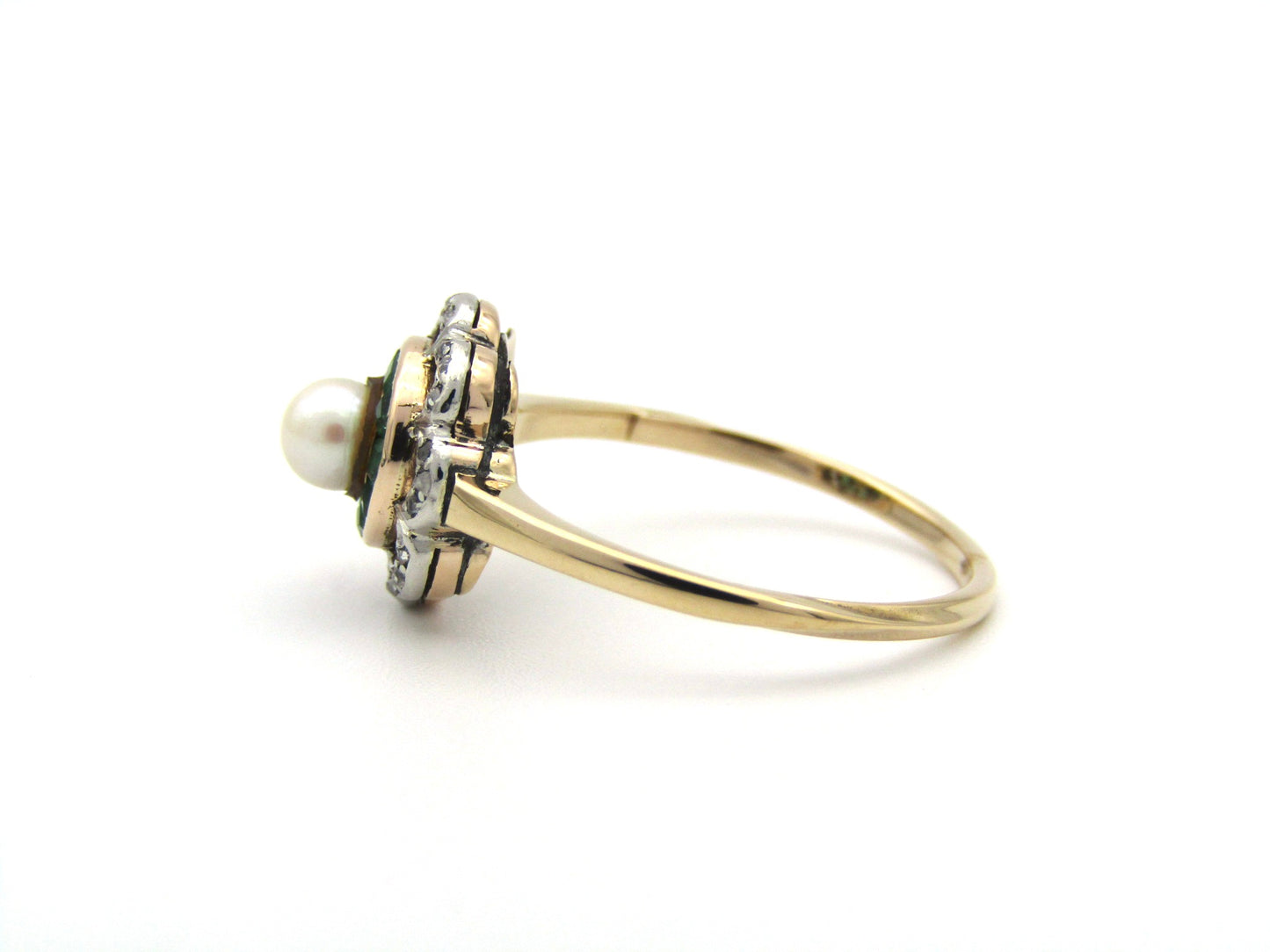 9K gold Edwardian pearl, emerald, and diamond flower ring.