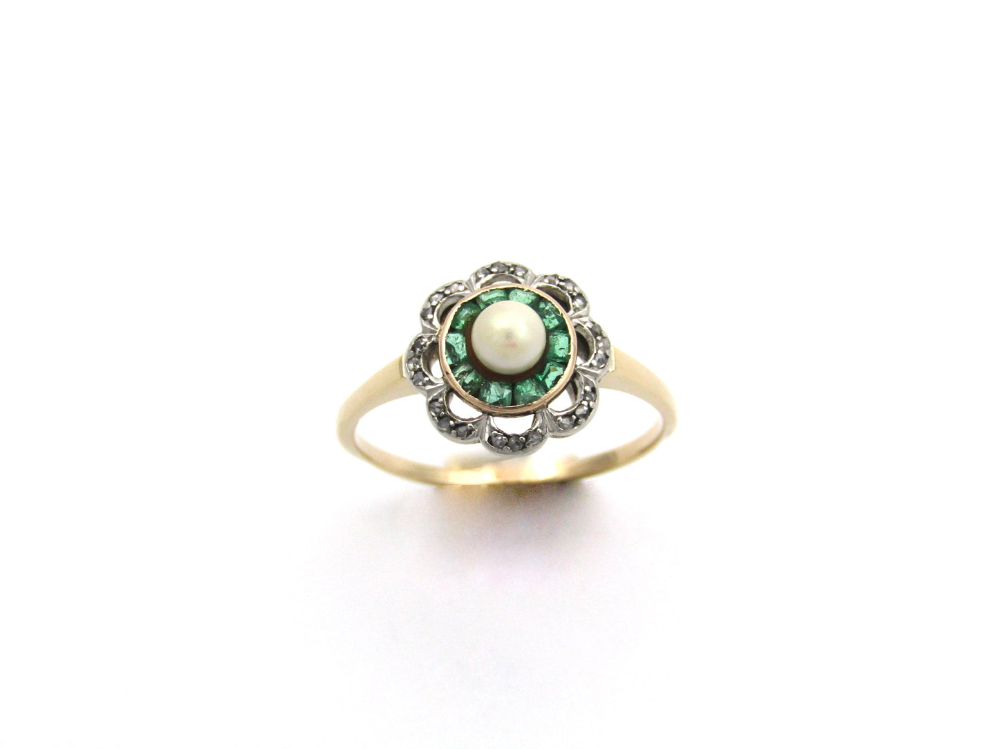 9K gold Edwardian pearl, emerald, and diamond flower ring.