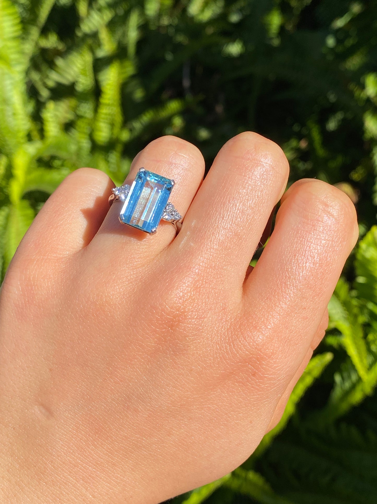 18K gold aquamarine and diamond ring, London, 1973.