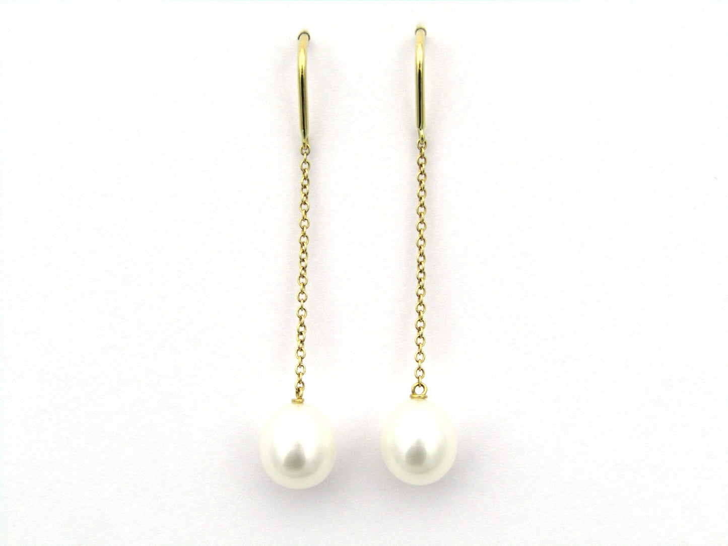 18K gold Tiffany & Co. "Pearls by the Yard" chain earrings.