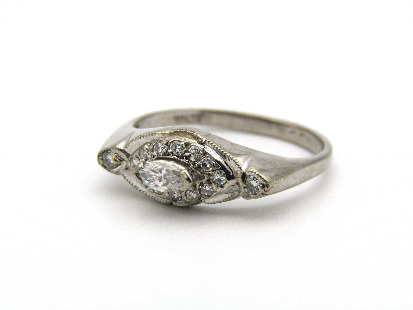 18kt gold diamond ring.