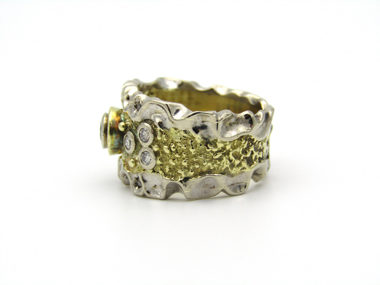 18kt gold diamond ring.