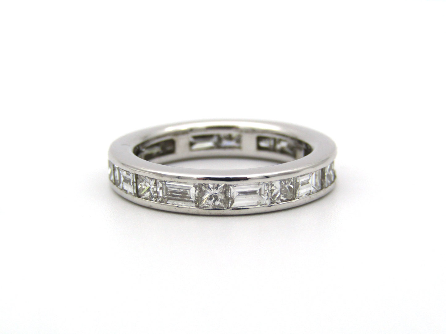 18K gold diamond eternity ring.