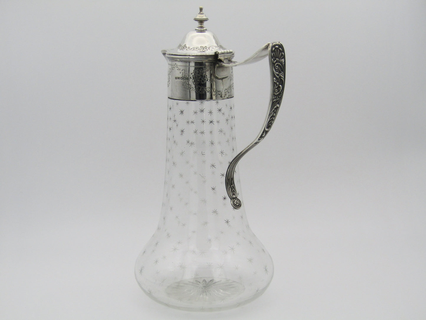 Sterling silver mounted cut glass claret jug by Thomas Henry Blake, Sheffield 1913.