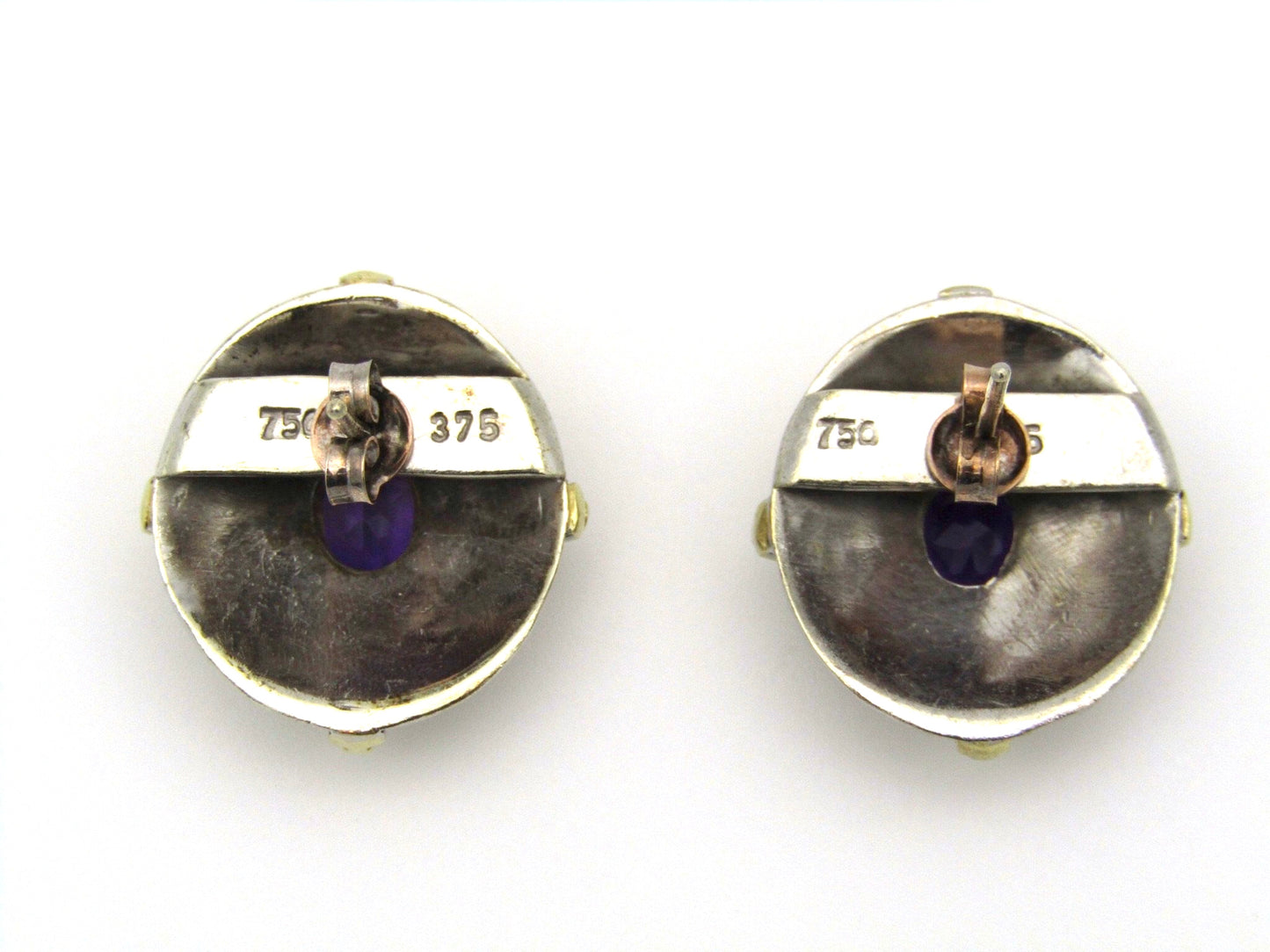 A pair of 18kt and 9kt gold amethyst earrings.