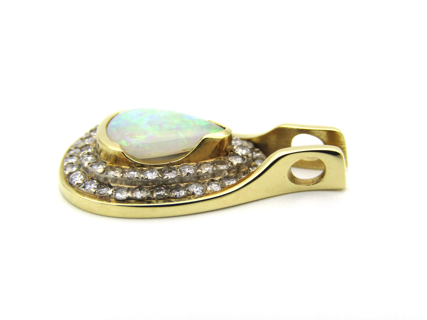 18K gold opal and diamond pendant.