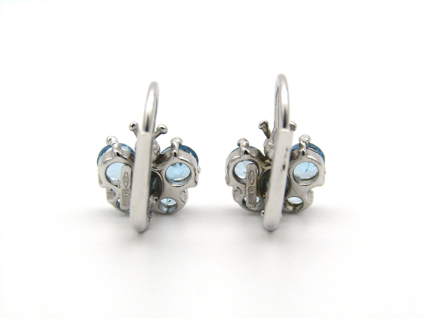18K gold blue topaz butterfly earrings.